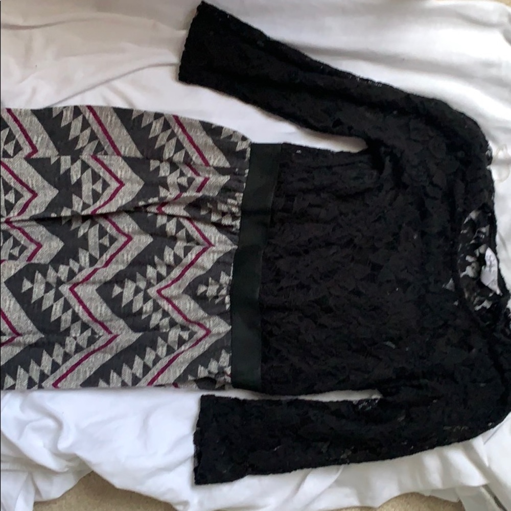 Black lace dress with a chevron bottom